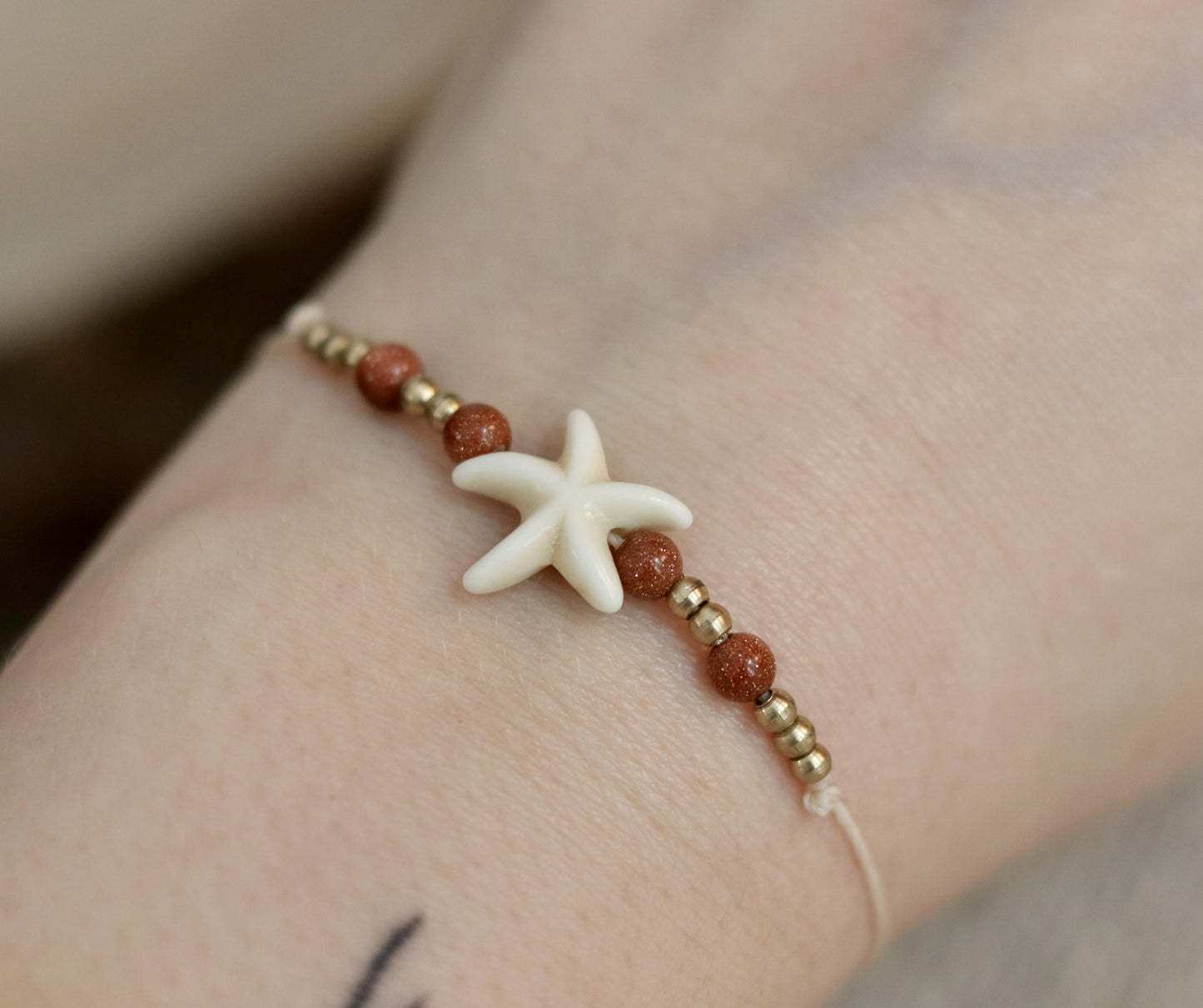Goldfluss Stern Muschel Makramee Armband Chenoas Zaubergarten